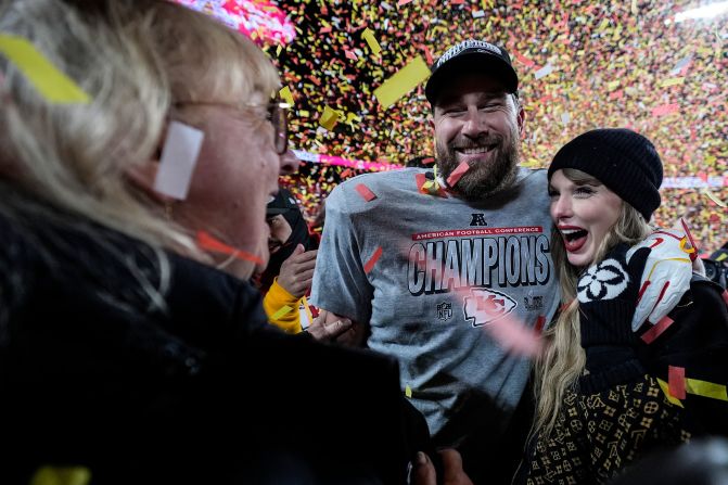 Donna Kelce stands with her son, Kansas City Chiefs tight end Travis Kelce, and <a  target="_top" href="/newspapers?url=https://www.cnn.com/sport/live-news/nfl-playoffs-01-26-2025#cm6egrqh200003b6m4ikihndu">Taylor Swift</a> after the Chiefs won the AFC Championship in Kansas City, Missouri, on January 26. Swift was seen watching the game from a suite with Donna Kelce, her mom, Andrea, and her friend Ashley Avignone. During the first half, she excitedly gave Kelce’s mom and her own mom a group hug after Kansas City scored and took the lead during what turned out to be a nail-biter game.