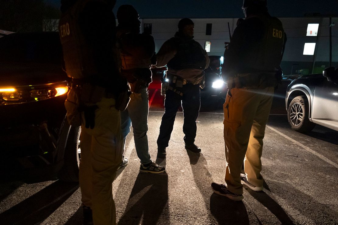 ICE officers gather for a briefing before an enforcement operation January 27 in Silver Spring, Maryland.