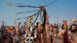 Naga Sadhus, or Hindu holy men, take a holy dip in the Triveni Sangam, the confluence of three holy rivers on Mauni Amavasya, or new moon day, during the Maha Kumbh Mela festival in Prayagraj, India, on Wednesday, January 29.