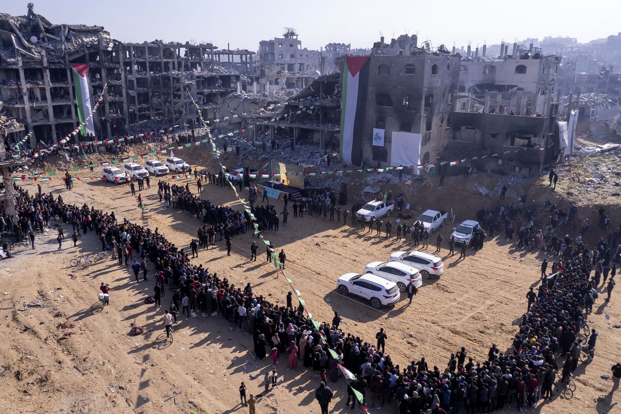 Red Cross vehicles wait for the hand-over of Israeli soldier hostage Agam Berger at the Jabalya refugee camp on Thursday.