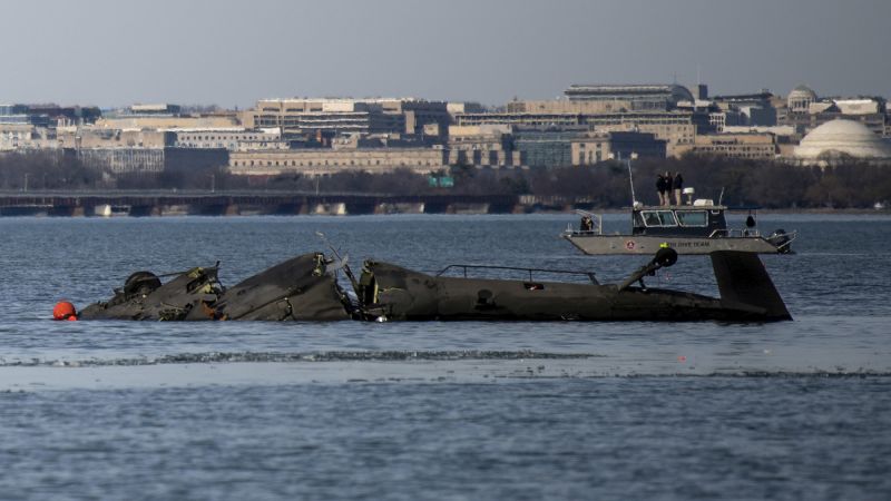 A trans National Guard pilot was falsely accused of flying the helicopter in the fatal plane collision | CNN Business