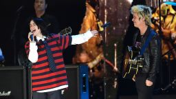 Billie Eilish, left, performs with Billie Joe Armstrong of Green Day during the FireAid benefit concert at The Forum in Inglewood, California, on Thursday, January 30, 2025.
