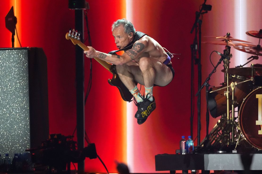 Flea of Red Hot Chili Peppers performs during the⁣ FireAid benefit ⁤concert at The Forum in⁢ Inglewood, California, on Thursday.