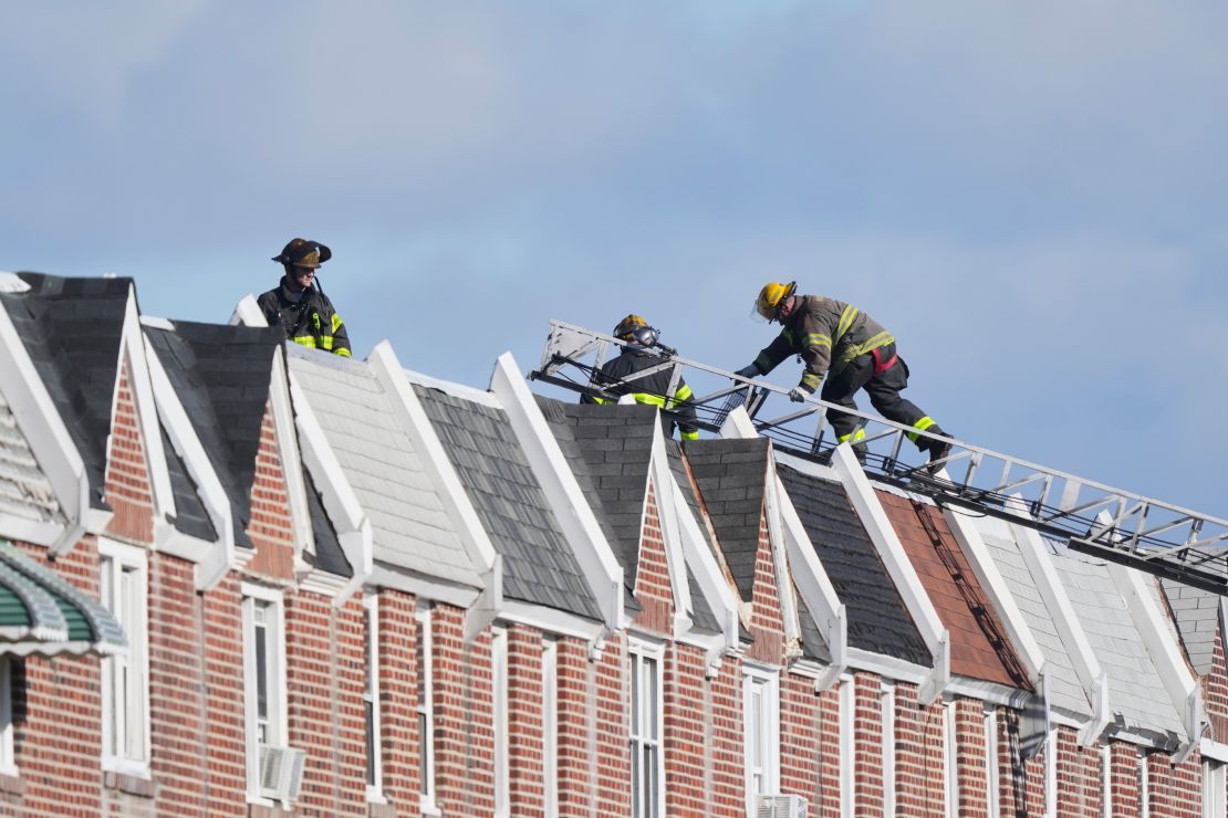 On Saturday, firefighting climbs near the scene of the plane crash.