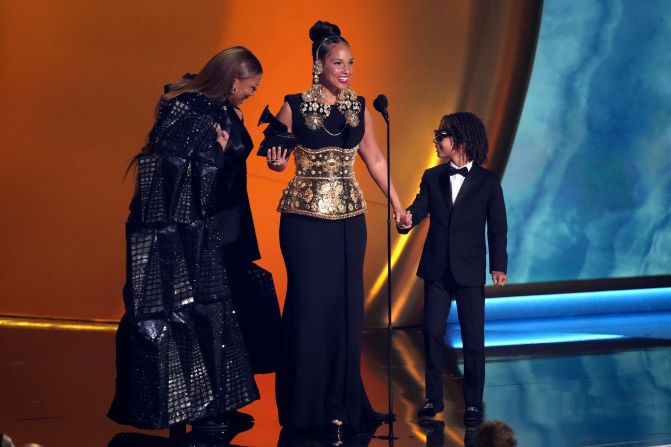 Queen Latifah, left, <a  target="_top" href="/newspapers?url=https://www.cnn.com/entertainment/live-news/the-grammys-award-show-02-2-25#cm6oimoq300313b6mxeorpmdq">presents the Dr. Dre Global Impact Award to Alicia Keys</a>. “This is for all the ladies that know the magic that they bring to the room,” Keys said. “This is not the time to shut down the diversity of voices. We’ve seen on this stage talented, hard-working people from different backgrounds with different points of view, and it changes the game. DEI is not a threat, it’s a gift.”
