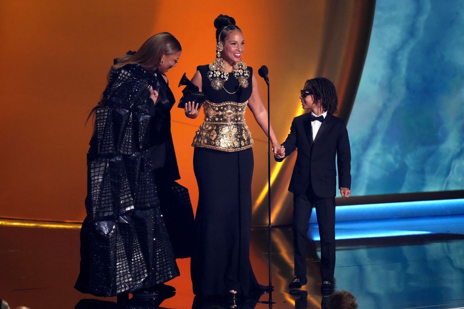 Queen Latifah, left, <a href="https://www.cnn.com/entertainment/live-news/the-grammys-award-show-02-2-25#cm6oimoq300313b6mxeorpmdq">presents the Dr. Dre Global Impact Award to Alicia Keys</a>. “This is for all the ladies that know the magic that they bring to the room,” Keys said. “This is not the time to shut down the diversity of voices. We’ve seen on this stage talented, hard-working people from different backgrounds with different points of view, and it changes the game. DEI is not a threat, it’s a gift.”