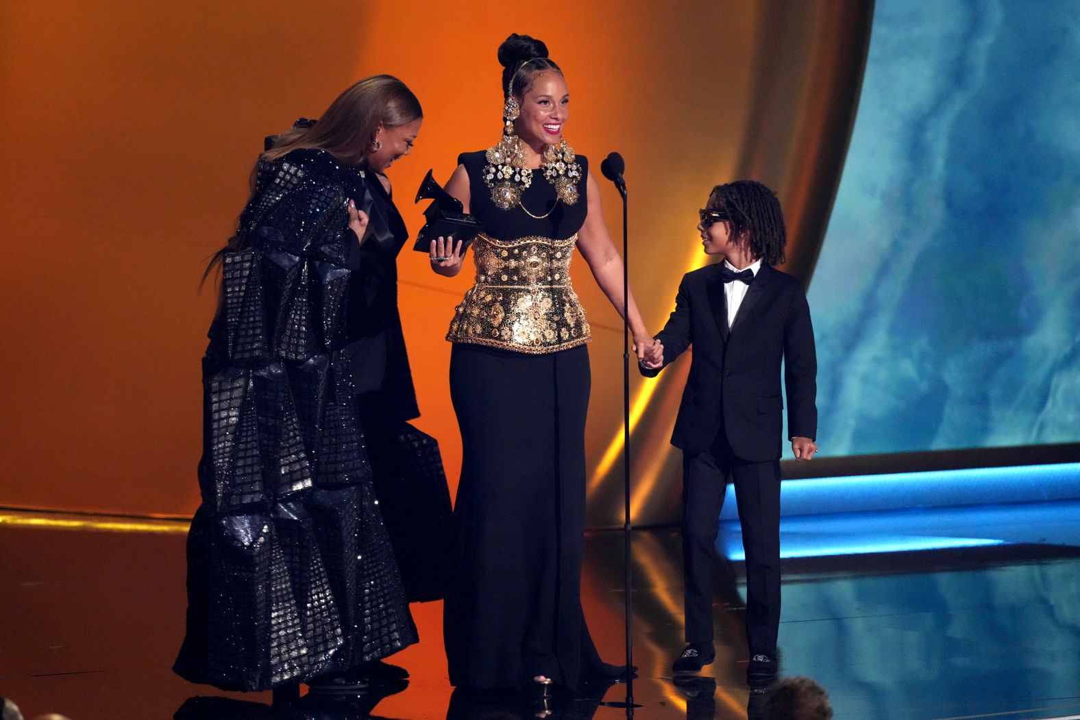 Queen Latifah, left, <a href="index.php?page=&url=https%3A%2F%2Fwww.cnn.com%2Fentertainment%2Flive-news%2Fthe-grammys-award-show-02-2-25%23cm6oimoq300313b6mxeorpmdq">presents the Dr. Dre Global Impact Award to Alicia Keys</a>. “This is for all the ladies that know the magic that they bring to the room,” Keys said. “This is not the time to shut down the diversity of voices. We’ve seen on this stage talented, hard-working people from different backgrounds with different points of view, and it changes the game. DEI is not a threat, it’s a gift.”