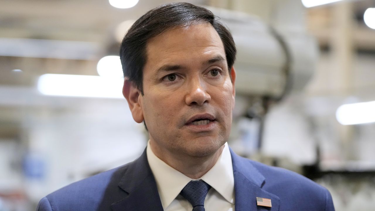 U.S. Secretary of State Marco Rubio speaks to the media during a visit to aircraft maintenance firm Aeroman in San Luis Talpa, El Salvador, Monday, Feb. 3, 2025. (AP Photo/Mark Schiefelbein, Pool)
