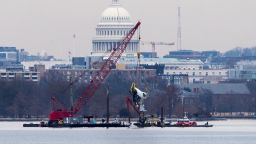 Wreckage from American Airlines flight 5342 is pulled from the Potomac River near Ronald Reagan National Airport on Monday, February 3, 2025.