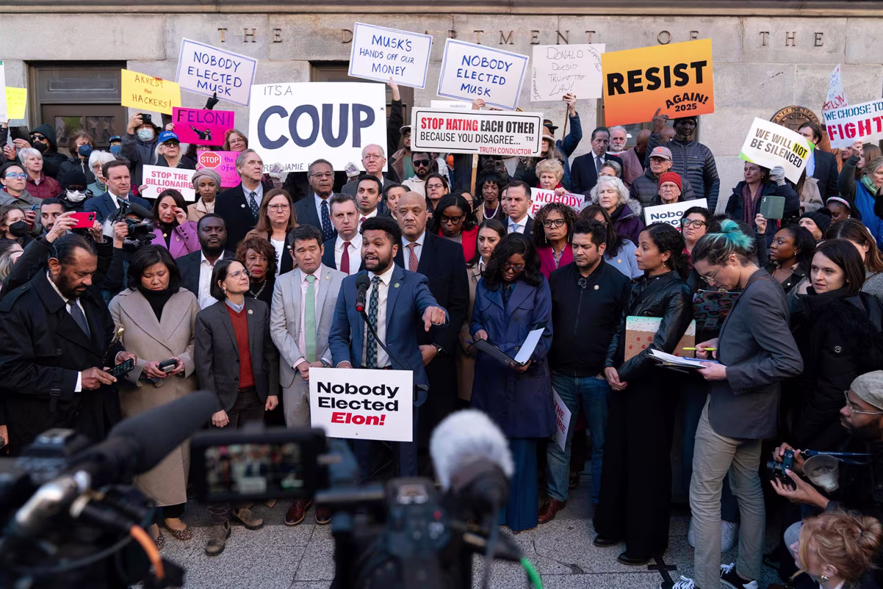 Rep. Maxwell Frost, accompanied by other members of congress, speaks during a rally against Elon Musk outside the Treasury Department in Washington, DC, on Tuesday.