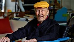 This undated image provided by Studio Kukkapuro shows Yrjö Kukkapuro, a renowned Finnish furniture designer whose postmodern style of chairs graced waiting rooms and museums alike, sitting in his famous Experimental chair in his studio outside Helsinki.