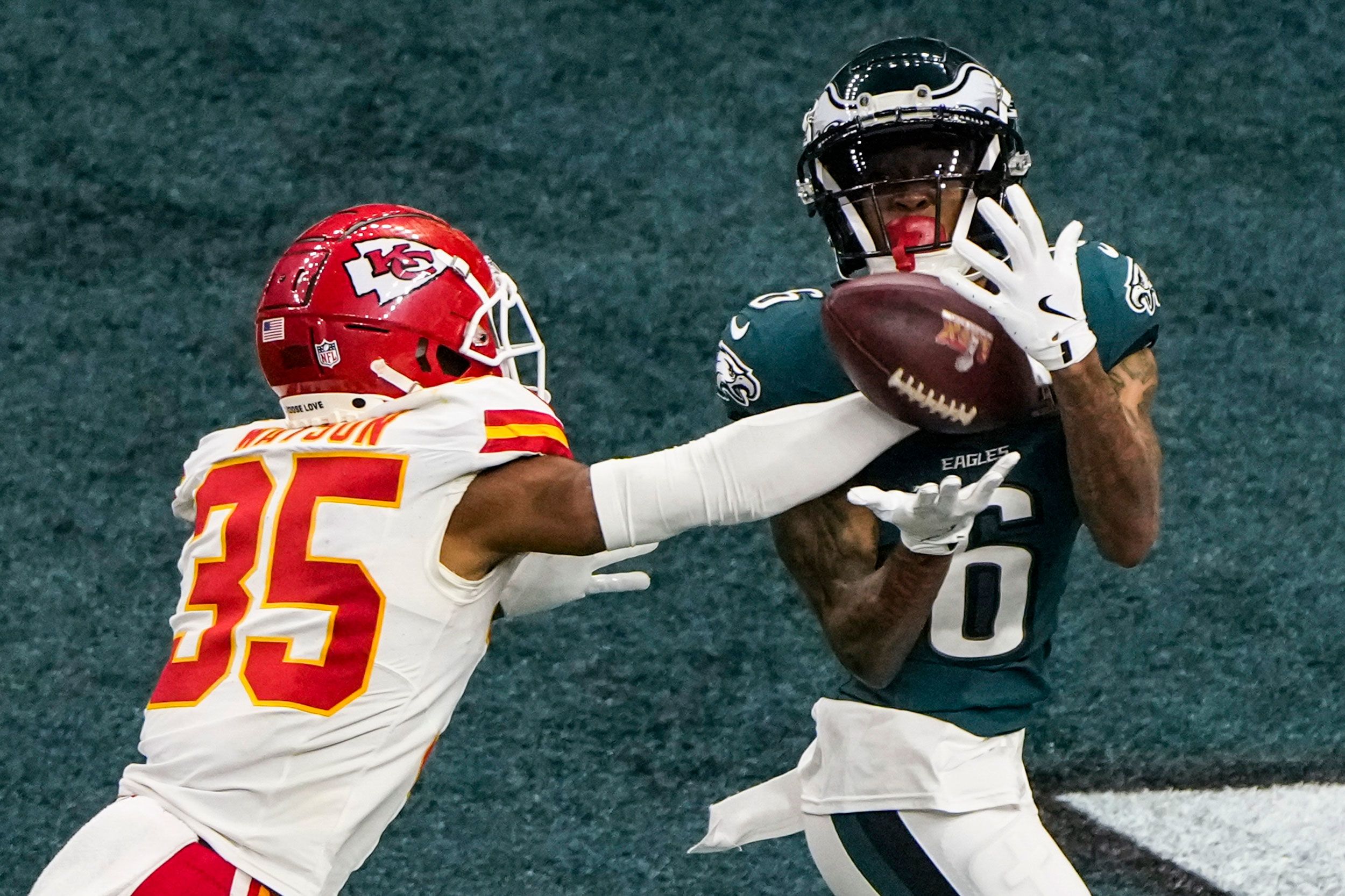 Eagles wide receiver DeVonta Smith catches a 46-yard touchdown pass from Hurts in the third quarter. The touchdown stretched the Eagles' lead to 33-0.