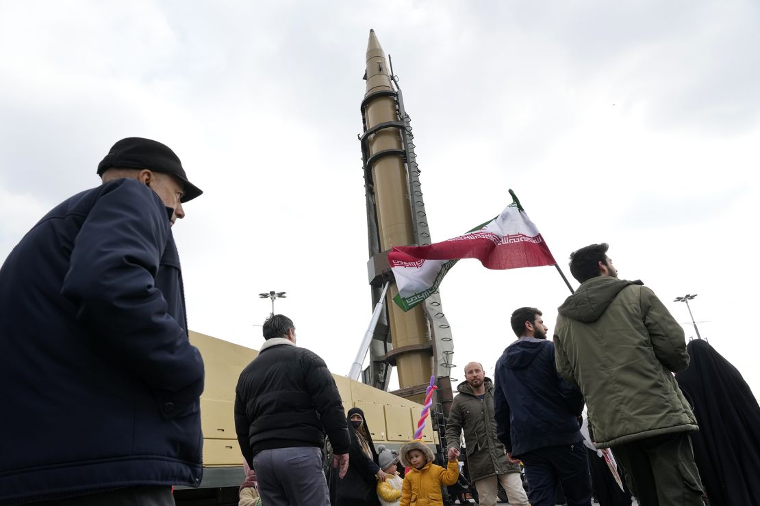 Iranian demonstrators march next to a domestically built missile during a rally commemorating the anniversary of the 1979 Islamic Revolution in Tehran earlier this week.