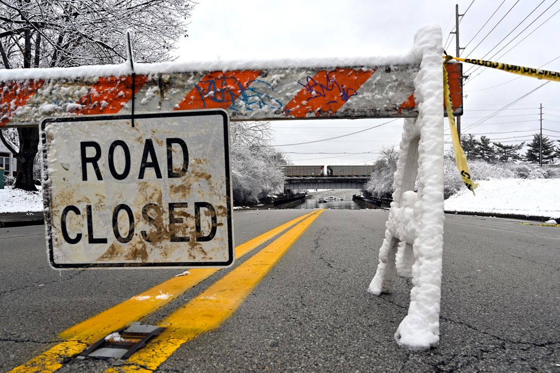 A road is closed due to flooding in Louisville, Kentucky, on Sunday.