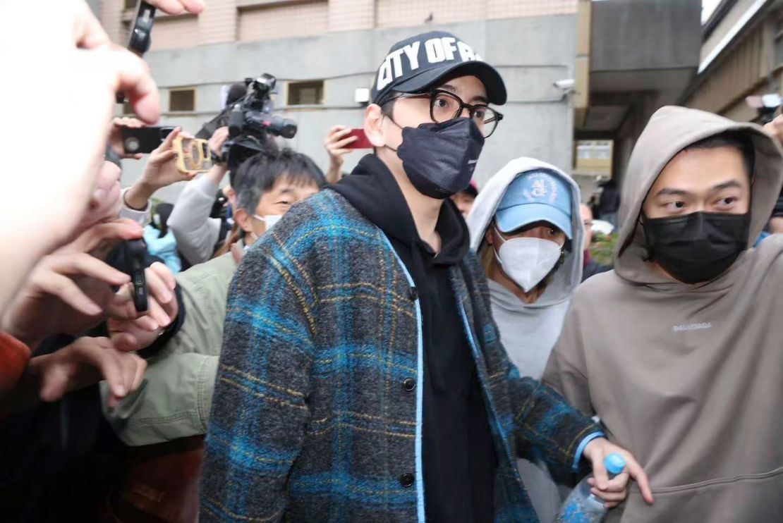 Taiwanese actor Darren Wang leaves the police department in Taipei, Taiwan, after being released on bail on February 18, 2025.
