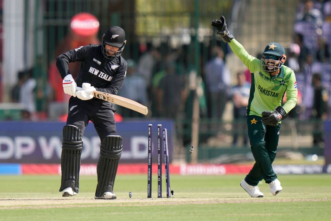 Pakistan's Mohammad Rizwan celebrates after the dismissal of New Zealand's Devon Conway during an ICC Champions Trophy match in Karachi on Wednesday, February 19, 2025.