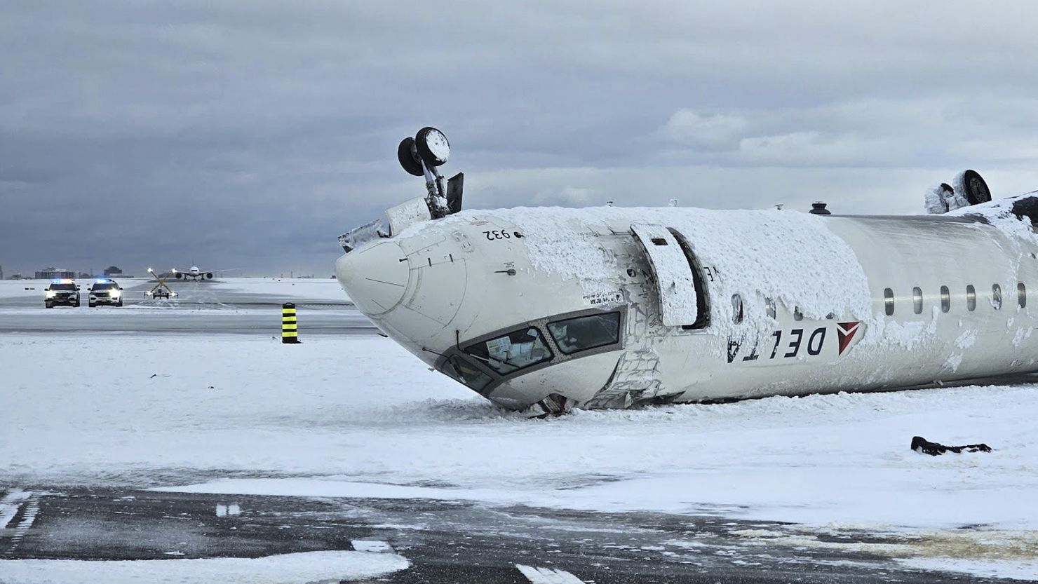 The wreckage of a Delta Air Lines jet on February 18 after it burst into flames and flipped upside down at Toronto Pearson International Airport in Mississauga, Ontario.