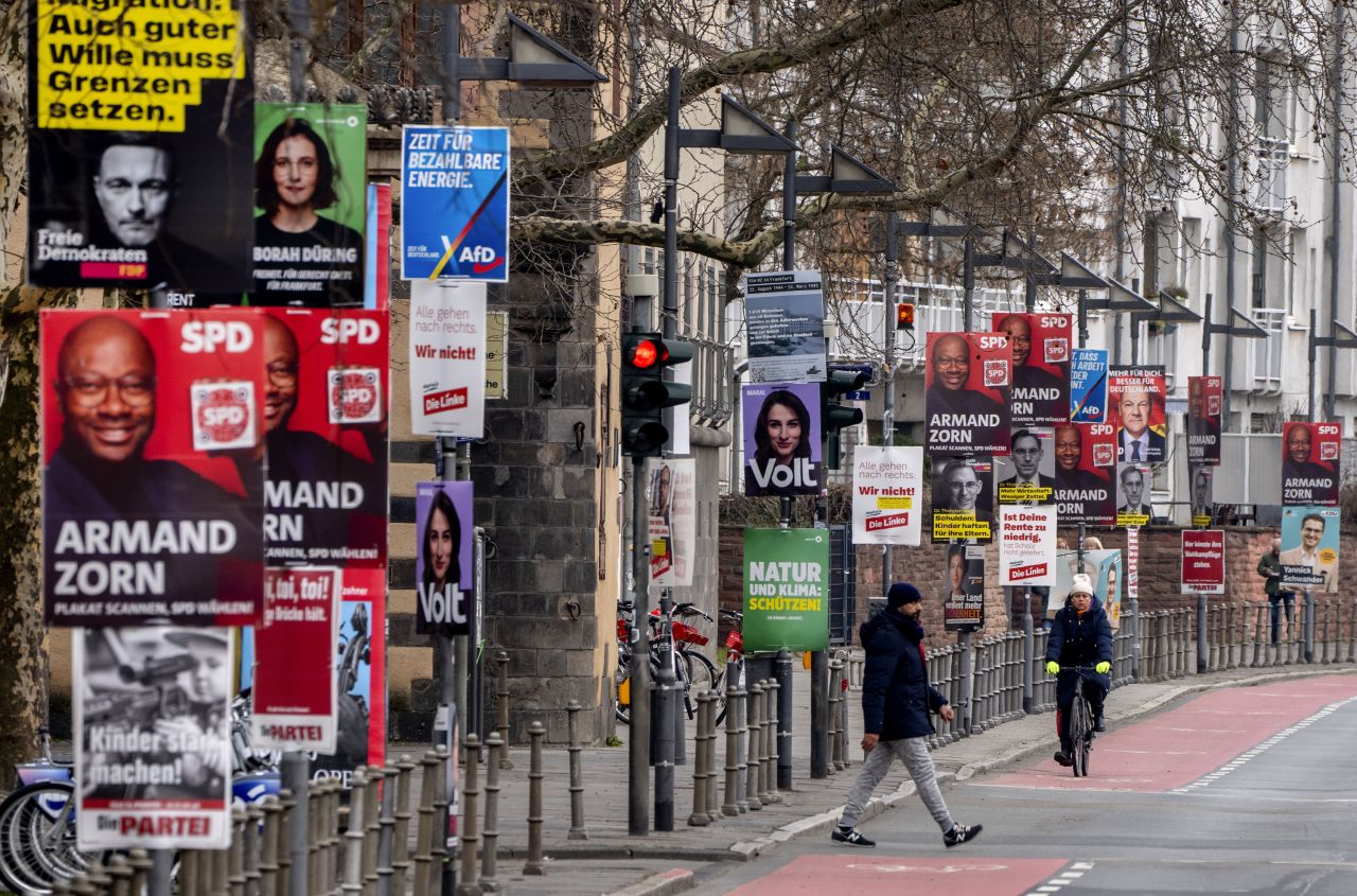 Election posters for various parties are seen on lamp poles in Frankfurt, Germany, on Thursday.