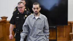 Hadi Matar, right, charged with severely injuring author Salman Rushdie in a 2022 knife attack, walks in to Chautauqua County court in Mayville, N.Y., Thursday, Feb. 20, 2025. (AP Photo/Adrian Kraus)