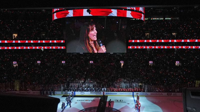 Singer Chantal Kreviazuk changes lyrics of Canadian anthem at hockey game to protest Trump’s 51st state remarks