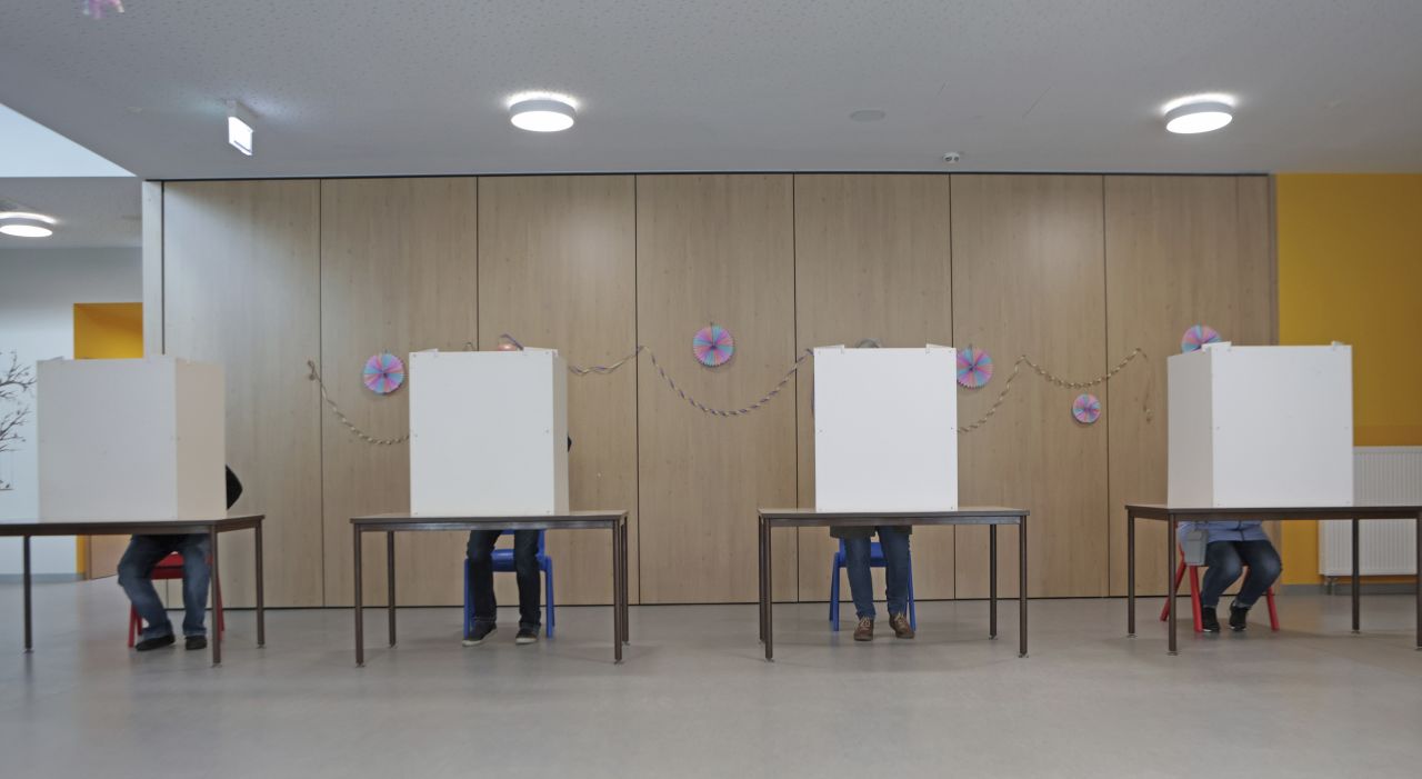 23 February 2025, Saxony-Anhalt, Wernigerode: Eligible voters sit in the polling booths at a polling station at midday. The early election to the 21st German Bundestag takes place on Sunday. Photo by: Matthias Bein/picture-alliance/dpa/AP Images