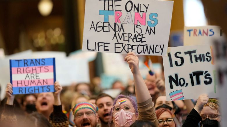 Protesters fill the Iowa state Capitol to denounce a bill that would strip the state civil rights code of protections based on gender identity, Thursday, February 27, in Des Moines, Iowa.