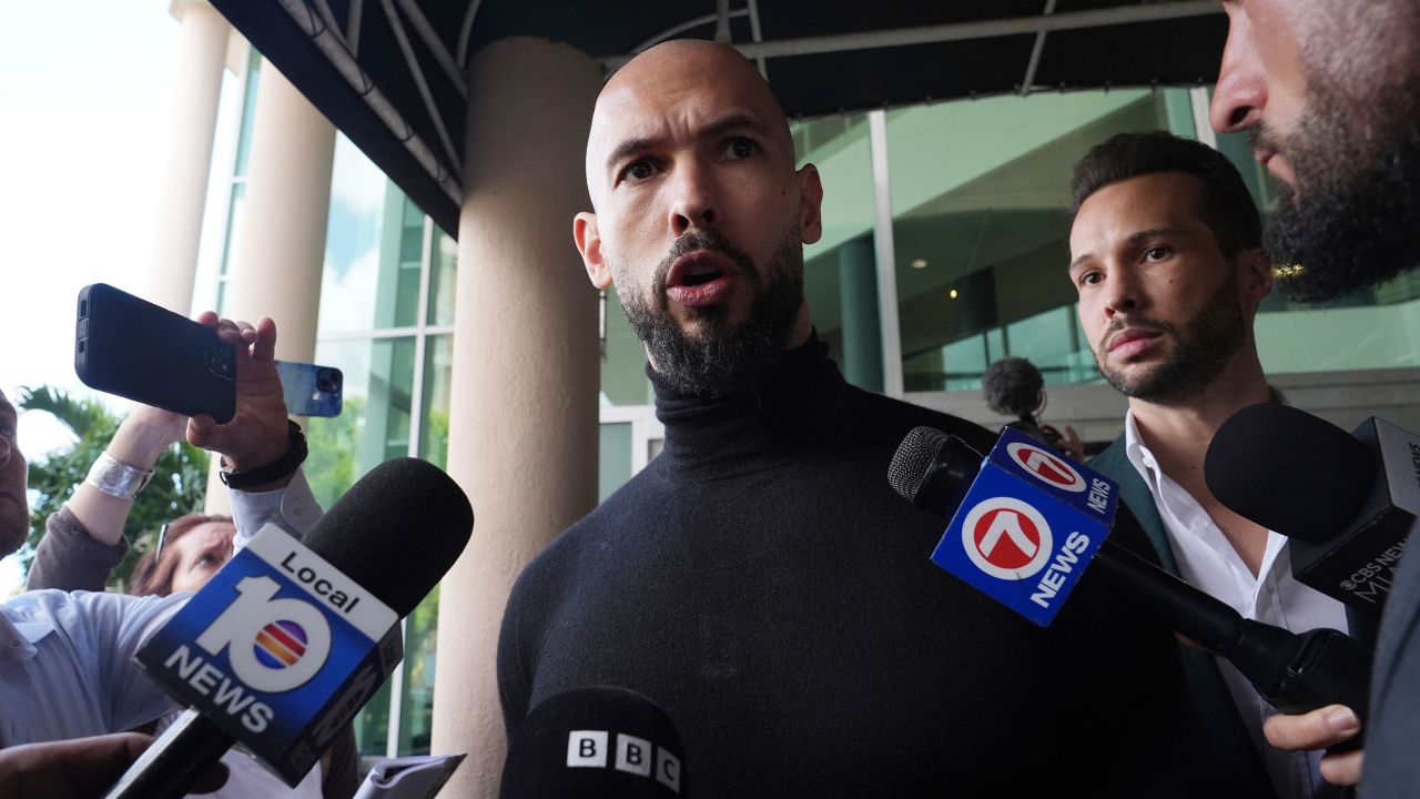 Influencer brothers Andrew and Tristan Tate arrive, Thursday, Feb. 27, 2025, in Fort Lauderdale, Fla. The brothers were charged with human trafficking in Romania and arrived in the U.S. after authorities lifted travel restrictions. (AP Photo/Marta Lavandier)