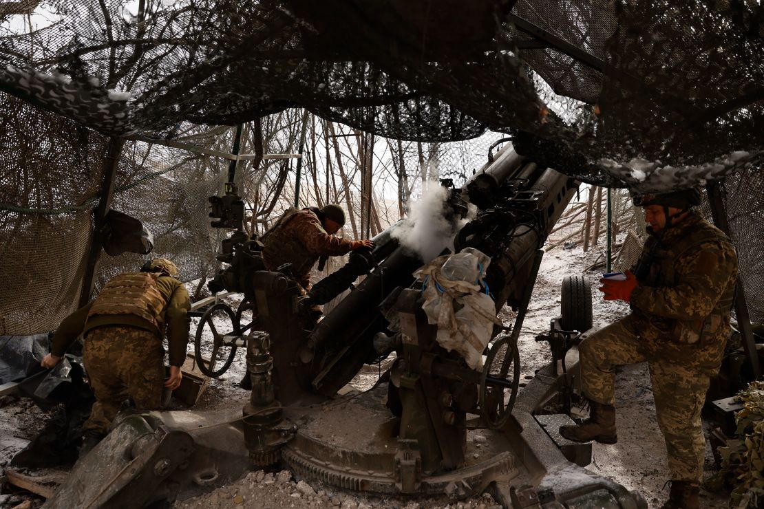 Ukrainian servicemen fire a howitzer towards Russian positions at the front line near Donetsk, Ukraine on March 2.