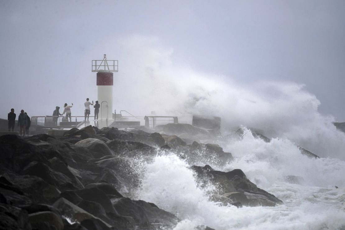 Waves crash onto rocks at the Spit, on the Seaway on the Gold Coast, Australia, Monday, March 3, 2025.