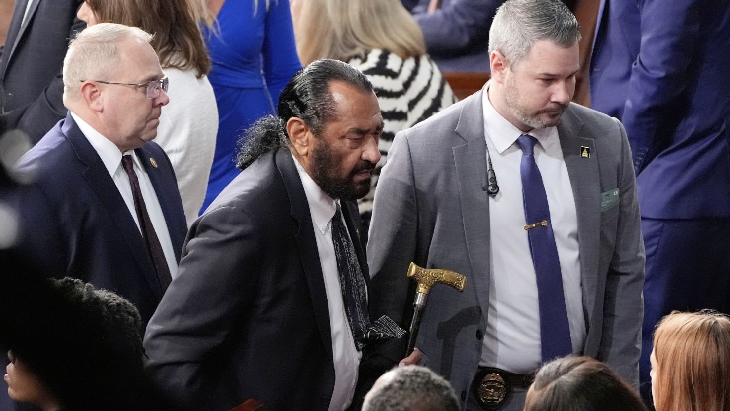 Democratic Rep. Al Green of Texas, center, is escorted out as President Donald Trump addresses a joint session of Congress at the Capitol in Washington, March 4, 2025.