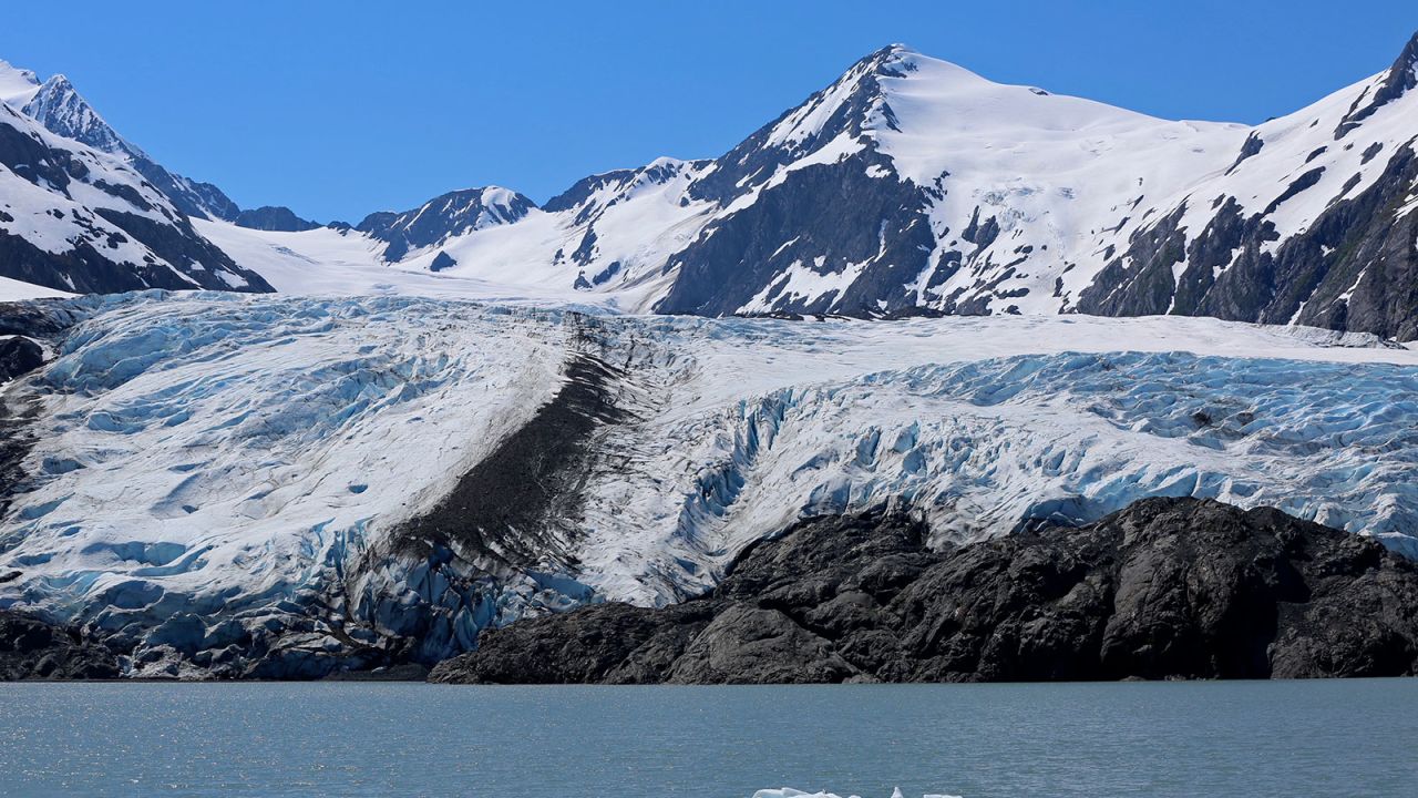 FILE - A chunk of ice floats past the Portage Glacier near Girdwood, Alaska, on June 14, 2021. (AP Photo/Mark Thiessen, file)