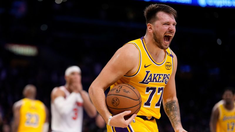 Luka Dončić and LeBron James lead LA Lakers to thrilling OT win over New York Knicks, extend win streak | CNN