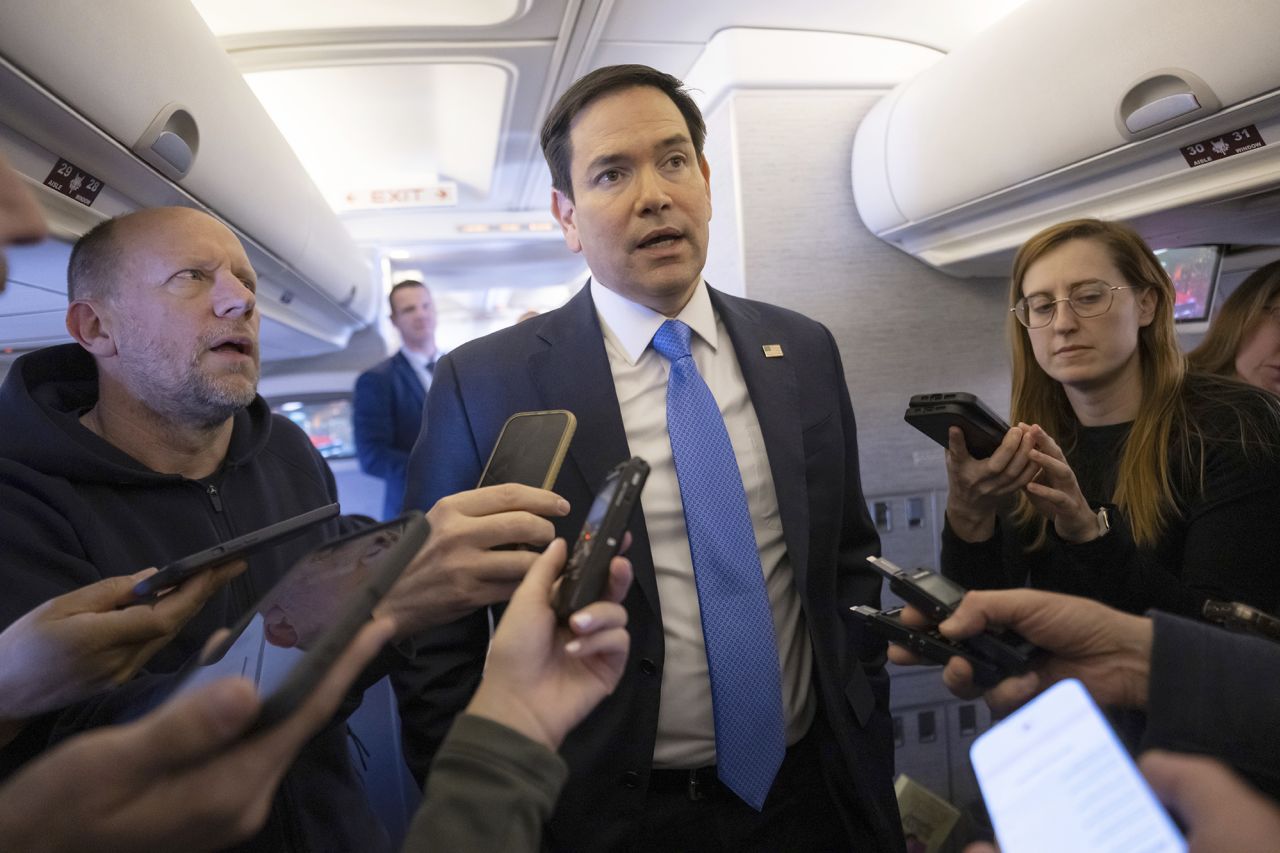 US Secretary of State Marco Rubio speaks with the media on his military airplane as he flies to Jeddah, Saudi Arabia, on Monday.