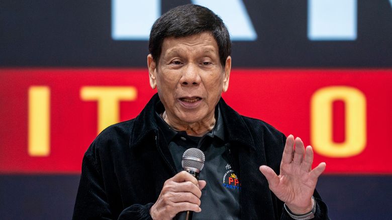 Former President of the Philippines Rodrigo Duterte speaks inside the Southorn Stadium during a thanksgiving gathering organized by Hong Kong-based Filipino workers for the former populist president in Hong Kong on March 9, 2025.