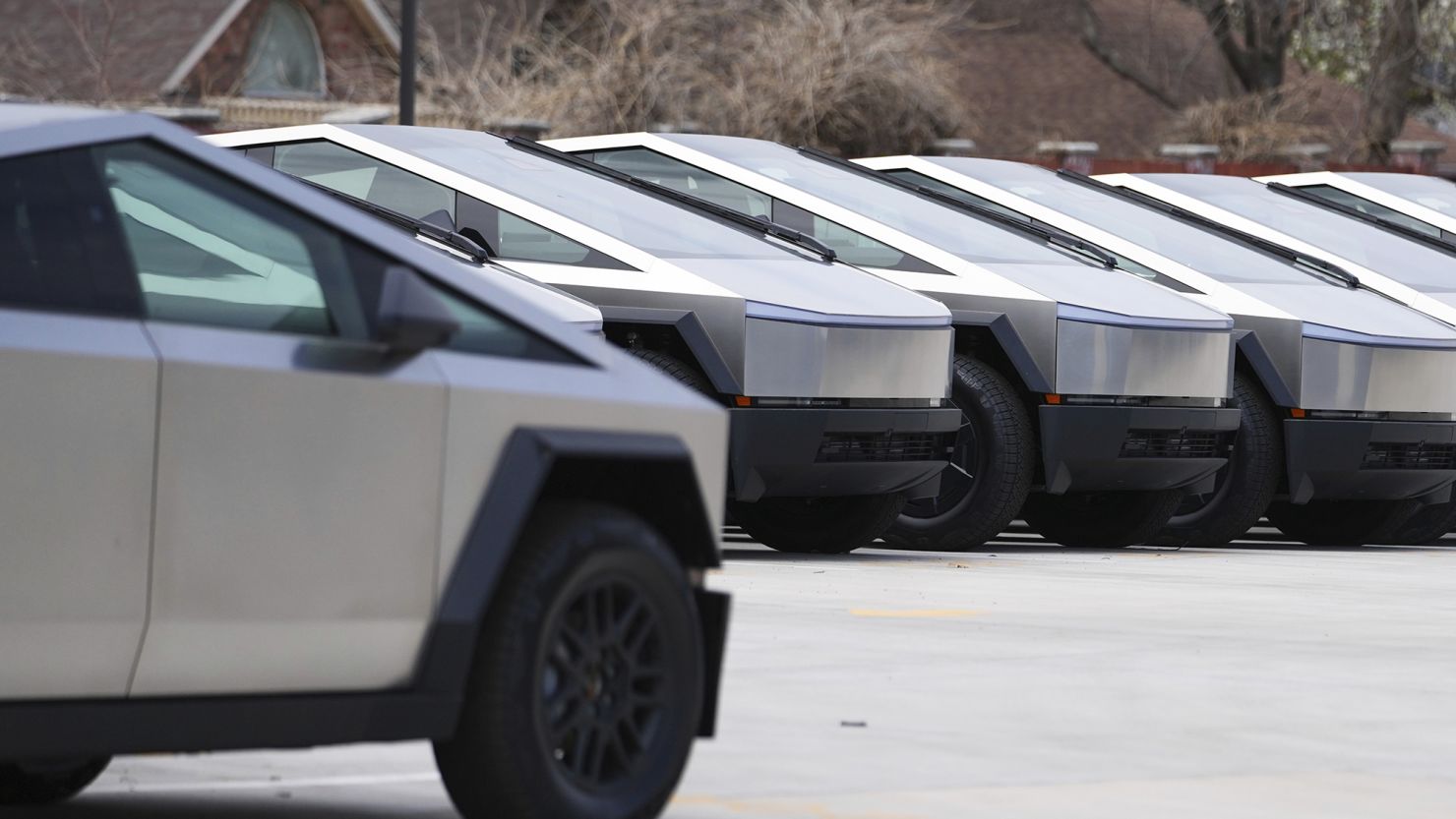 Tesla Cybertrucks are seen parked at a Tesla sales lot in Plano, Texas.