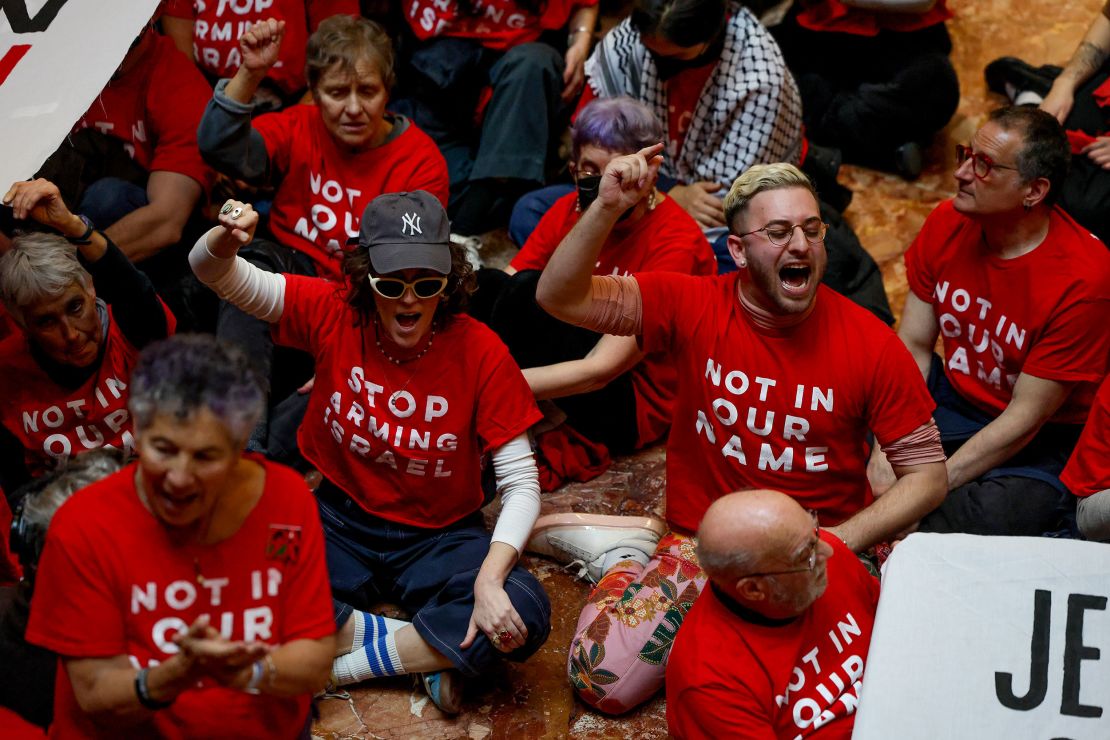 Demonstrators from the group Jewish Voice for Peace protest inside Trump Tower in support of Columbia University graduate student Mahmoud Khalil.