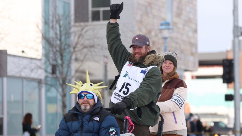 Former reality TV star Jessie Holmes wins longest-ever Iditarod Trail Sled Dog Race in Alaska