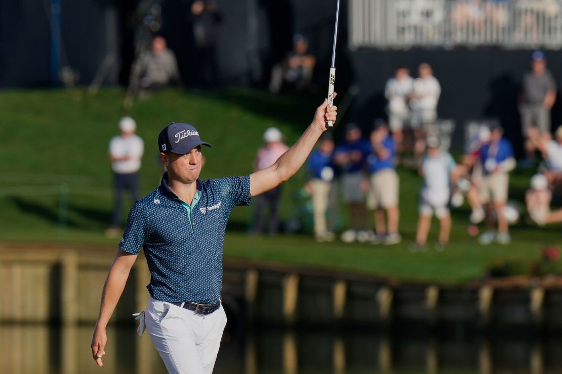 Thomas celebrates after making a birdie on the 17th hole.