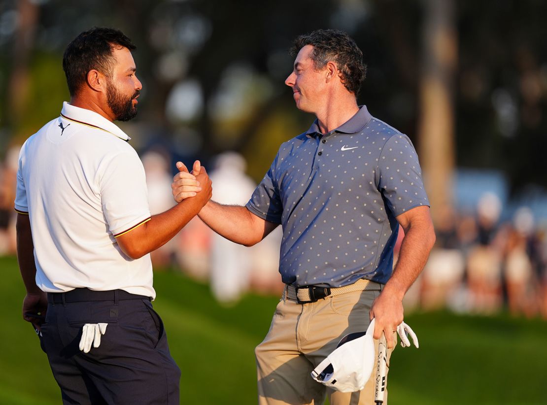 McIlroy and Spaun embraced each other following Saturday's third round of The Players Championship.