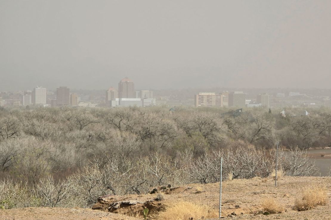 Dust shrouds buildings in Albuquerque, New Mexico, on March 18, 2025.