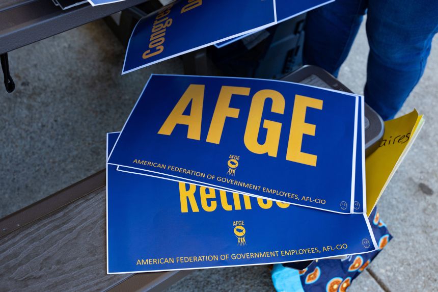 The American Federation of Government Employees (AFGE) union, representing members of the TSA, holds a picket outside Norfolk International Airport in Norfolk, United States, on March 25, 2025, to protest anti-union actions by the Trump administration.