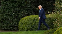 President Donald Trump walks from the Oval Office in Washington, DC, on Friday.