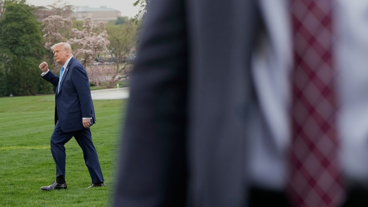 President Donald Trump walks from the Oval Office to board Marine One on the South Lawn of the White House en route to Florida, Friday, March 28, 2025, in Washington. (AP Photo/Mark Schiefelbein)