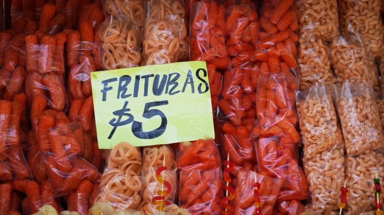 "Frituras" or fried treats are displayed for sale on a vendor's stall in Chapultepec park in Mexico City, Saturday, March 29, 2025.