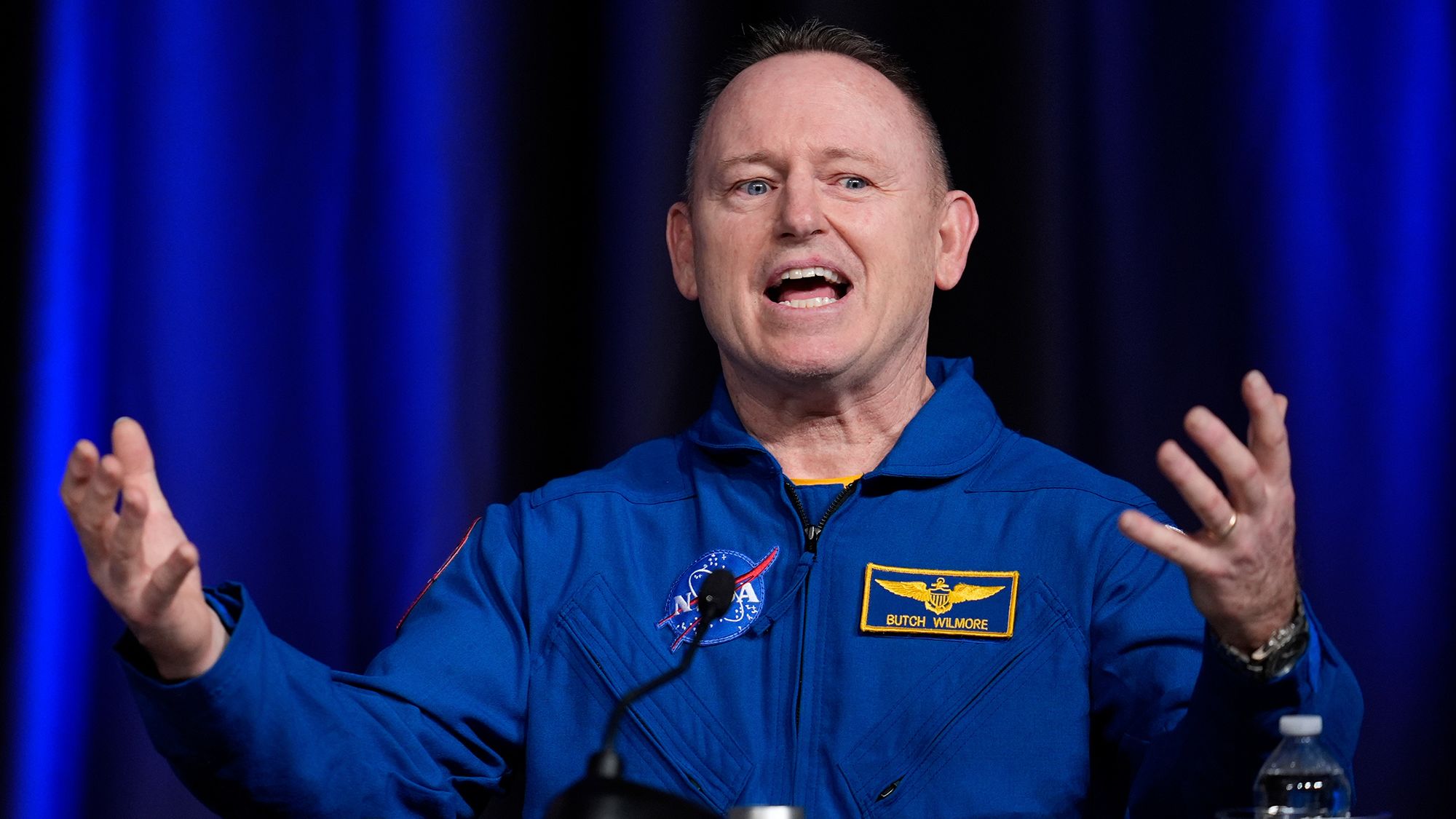 Astronaut Butch Wilmore talks to reporters during a press conference at Johnson Space Center on Monday, March 31, 2025, in Houston. (AP Photo/Ashley Landis)