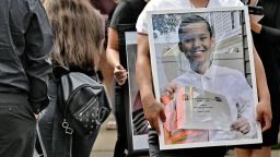 A portrait of Nyah Mway is brought out from the funeral home in Utica, New York, on July 6, 2024.