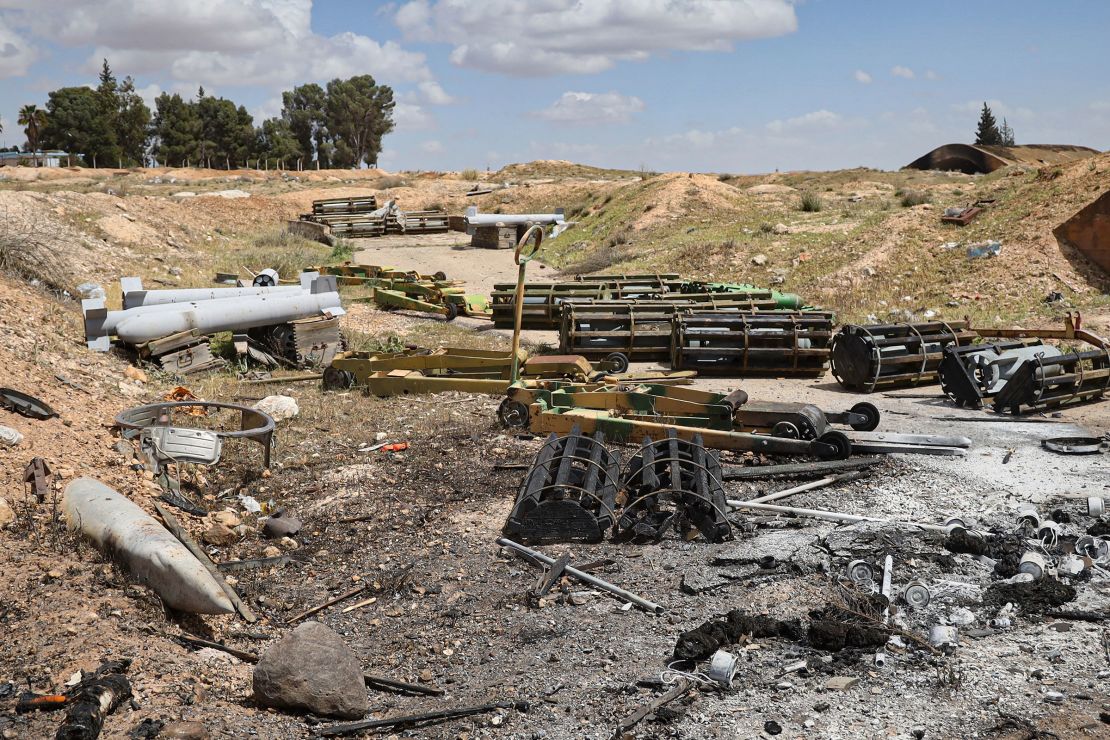 Debris is scattered at the site of an Israeli strike on a military airbase near Hama, Syria, on April 3.