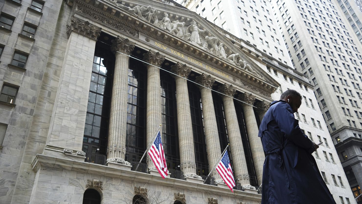 A pedestrian walk past the New York Stock Exchange.