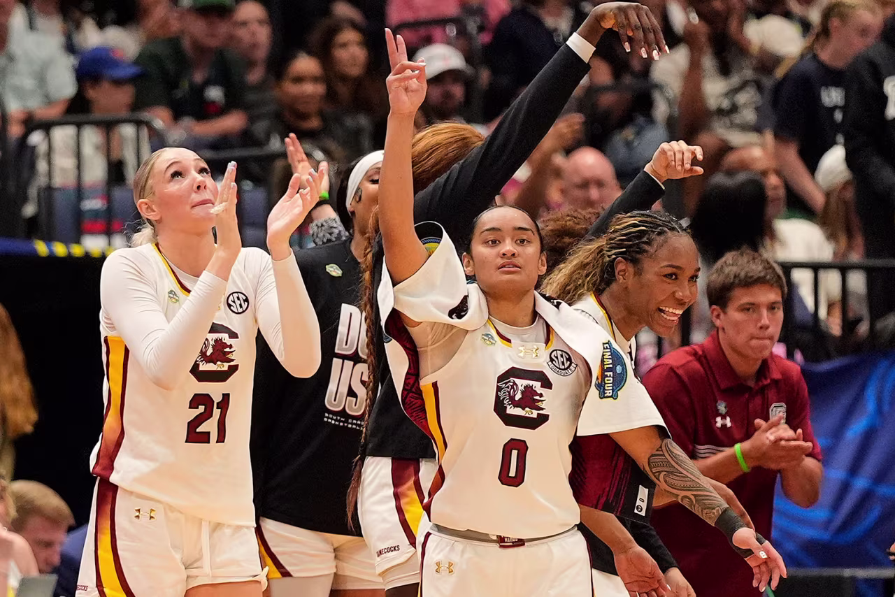 South Carolina forward Chloe Kitts, guard Te-Hina Paopao and guard Bree Hall react during the second half against Texas.
