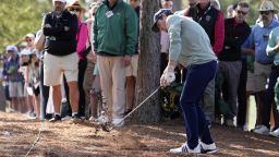 Nick Dunlap hits from the pine straw on the first hole during the first round at the Masters golf tournament, Thursday, April 10, 2025, in Augusta, Ga. (AP Photo/Ashley Landis)